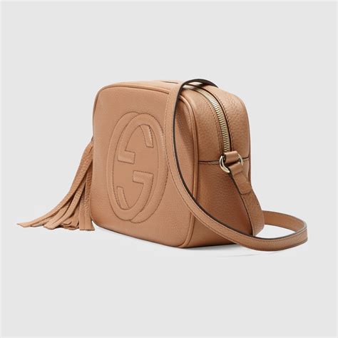 sfilate gucci disco|Rose Beige Leather Soho Small Disco Bag .